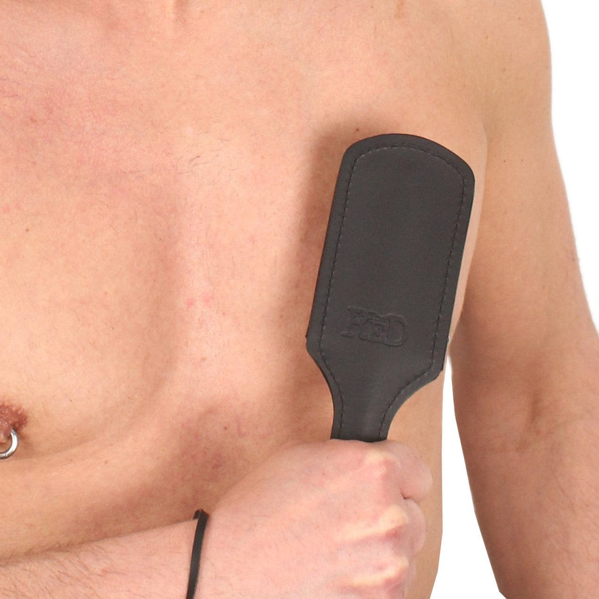 Lederpaddel harter Schlag