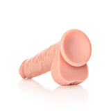 Realistischer Dildo gerade mit Hoden und Saugnapf Hautfarbe 23 cm