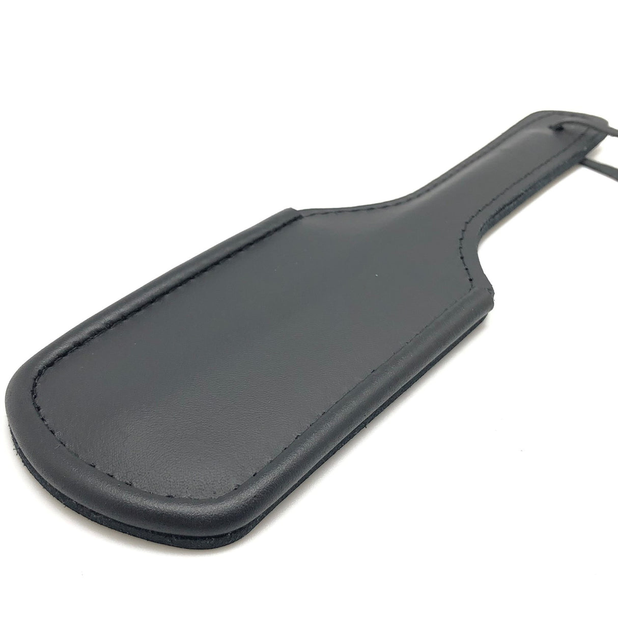 Lederpaddel harter Schlag